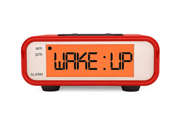 istock Modern Digital Alarm Clock with Wake Up Sign 472700514