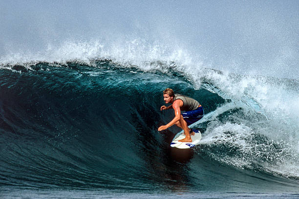 Picture of Surfing a Wave. Bali Island. Indonesia.