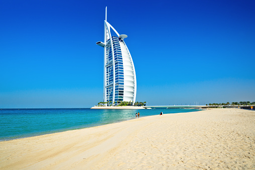 Dubai, UAE - October 6, 2023: Burj Al Arab hotel seen from Souk Madinat Jumeirah