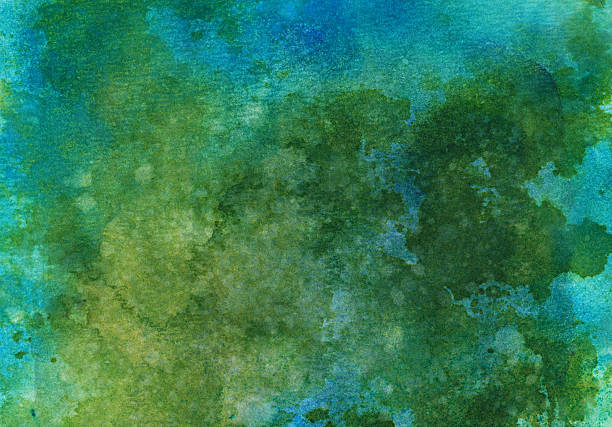 istock Blue and green watercolors on paper 472703940