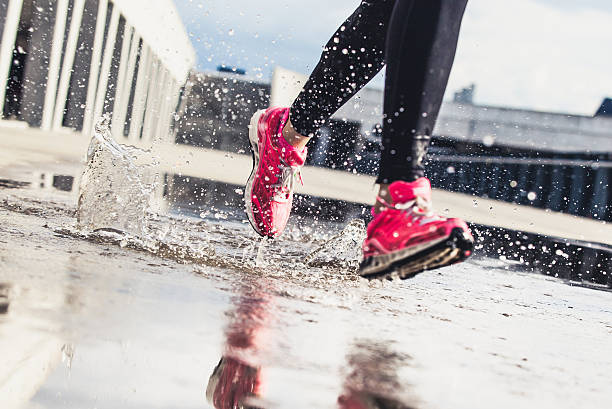 istock Woman's Athlete feet on the road 472704834