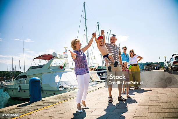 Happy Family All Together In Vacation Stock Photo - Download Image Now - 2015, Active Lifestyle, Active Seniors