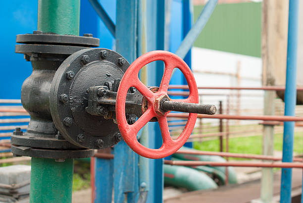 istock Cast iron valve on the water line. 472707022