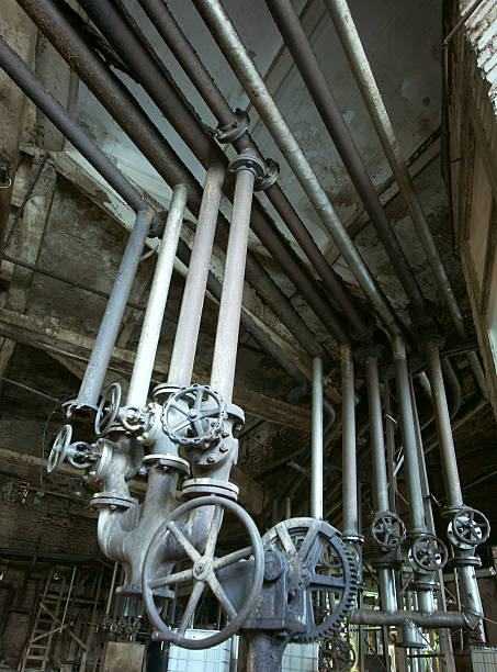 istock Old creepy, dark, decaying, destructive, dirty factory 472709378