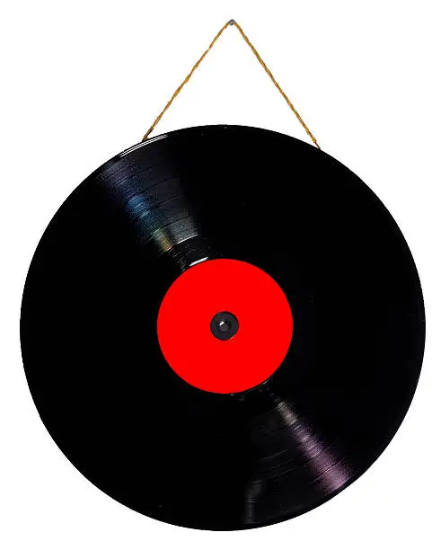 Photo of vinyl 33 rpm hanging with string as a picture