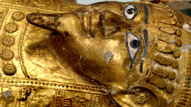 One big golden statue of the Egyptian pharoah