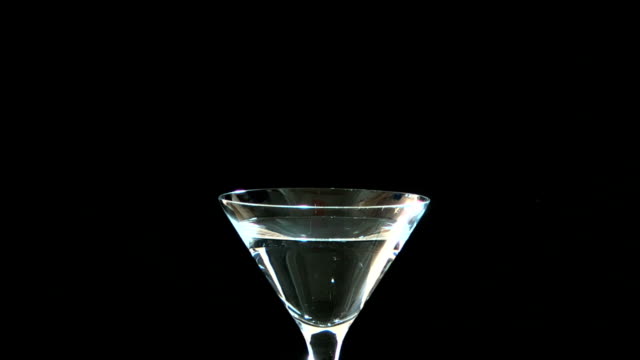 Cherry dropping into Martini Glass Slow Motion