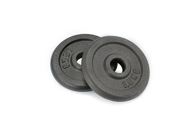 istock equipment dumbbell weights on white background 472722412