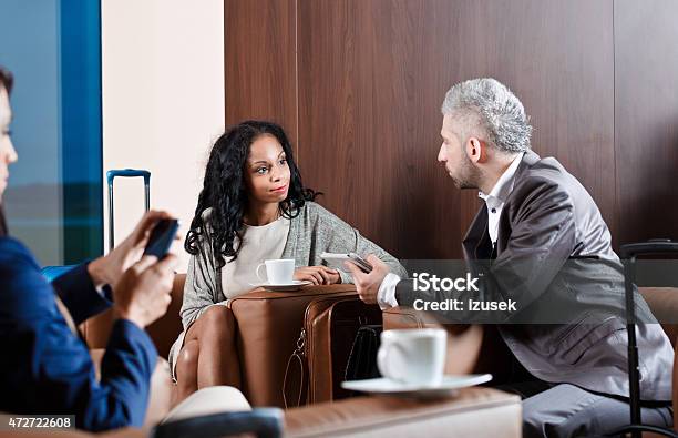 Business People Waiting For The Flight In Vip Lounge Stock Photo - Download Image Now