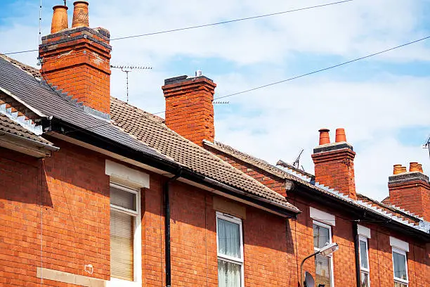 English rowhouses in Derby, detailed shot of roofs and chimneys.