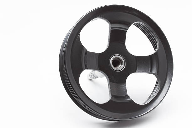 istock Black pulley car engine on a gray background 472727198