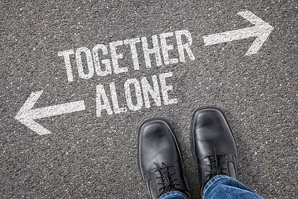 istock Decision at a crossroad - Together or Alone 472727228