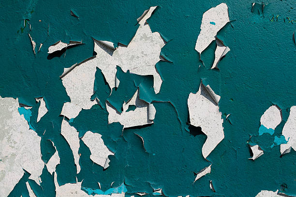 istock red rusted on the cyan green metal wall . Texture 472727988
