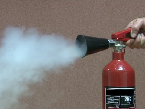 Fire Extinguisher being pushed