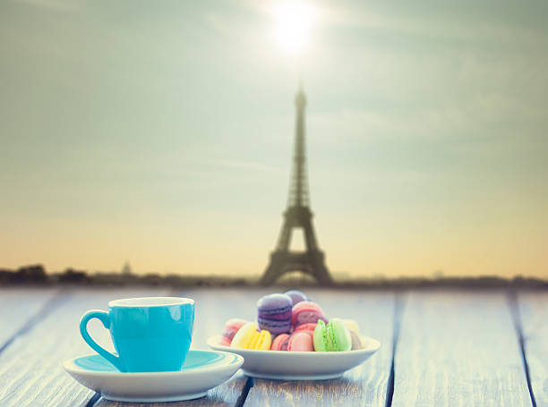 istock Cup of coffee and macarons 472778870