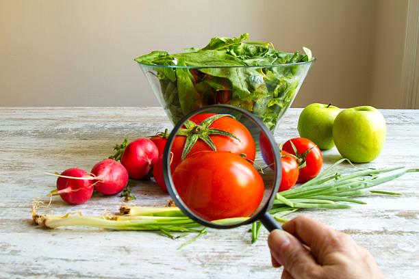 Analyzing food Analysing food, pesticides free vegetables insecticide photos stock pictures, royalty-free photos & images