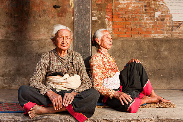 istock Old Nepali ladies resting in Bhaktapur 472801426
