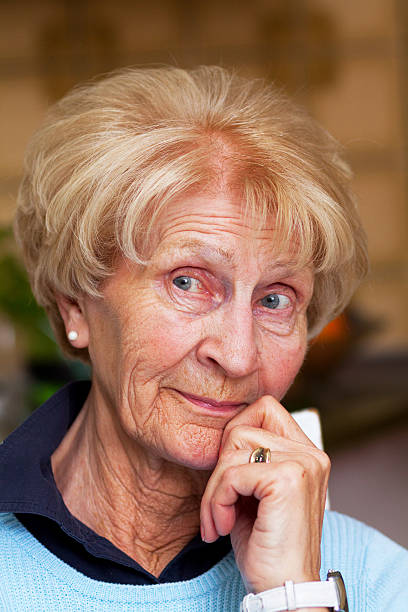 istock Impishly looking caucasian senior woman 472801606