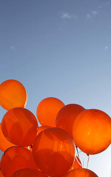 istock Orange Balloons and Blue Sky over Canada 472805240
