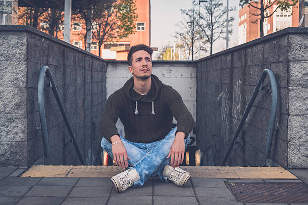 istock Young  man posing in an urban context 472816770