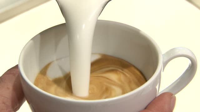 Close-up shot coffee cup being made by barista