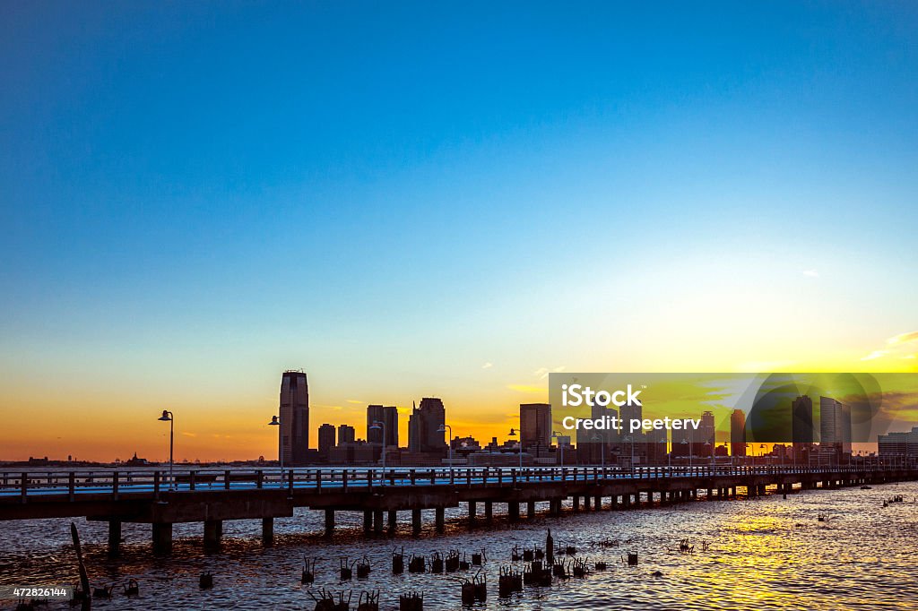 Jersey City sunset seen from Manhattan. 2015 Stock Photo