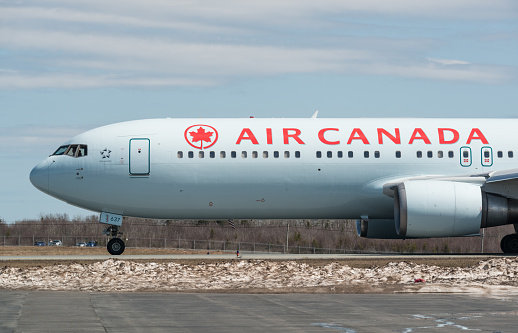 Goffs, Canada - May 3, 2015: An Air Canada Airbus A320 taxis towards a gate at Halifax Stanfield International Airport (YHZ).