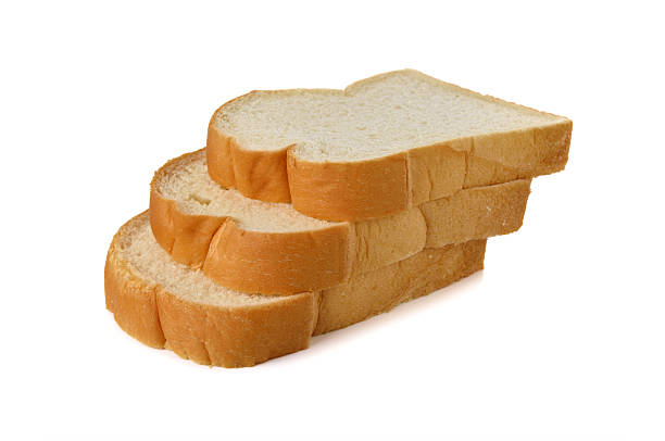 istock stack of sliced American white bread on white background 472830098