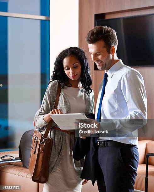 Two Business People In Vip Lounge At The Airport Stock Photo - Download Image Now - Airport, CEO, Celebrities