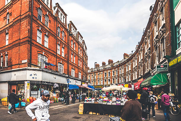 London, UK - May 5, 2011: Vibrant and colourful Brixton street market, many exotic shops and restaurants around.