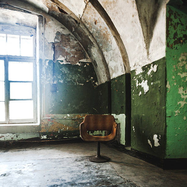 istock Chair in old abandoned building. 472831664