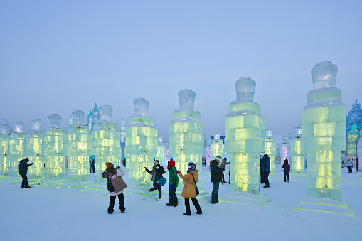 Harbin, China - February 13, 2015: International Ice and Snow Sculpture Festival. During the event, 800,000 visitors descend on the city, with 90% from China, this is one of the country’s top winter destinations.
