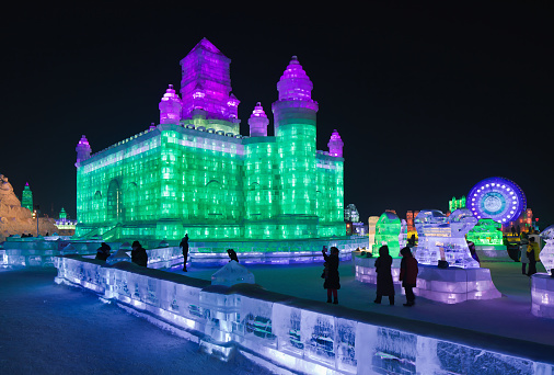Harbin, China - February 13, 2015:  The International Ice and Snow Sculpture Festival. During the event, 800,000 visitors descend on the city, with 90% from China, this is one of the country’s top winter destinations.