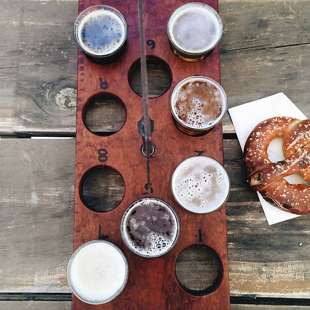 Tasting tray of craft beers with soft pretzel