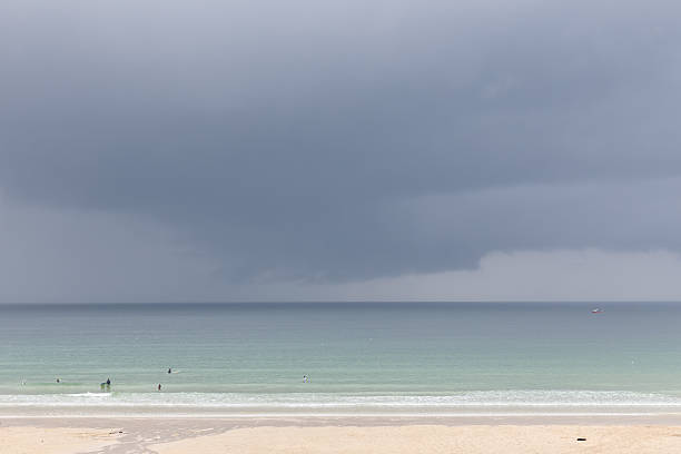 istock storm at sea from a sandy beach 472841112