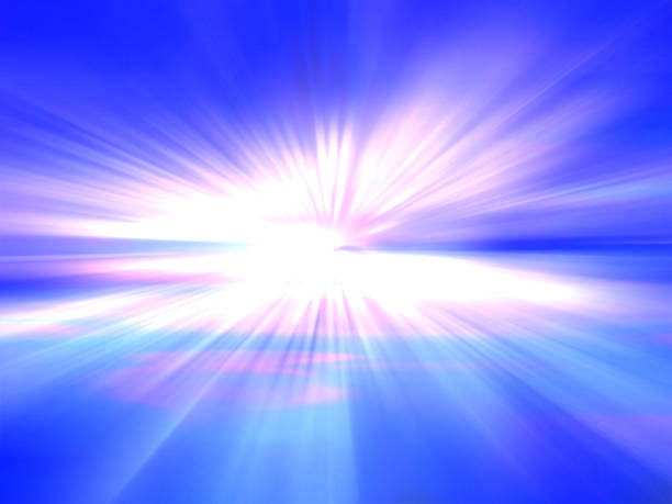 istock Sun on blue sky with lenses flare 472843804