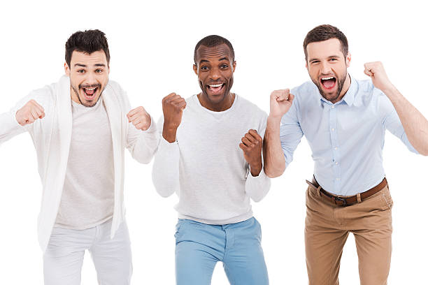 hombres aclamando. - cheering business three people teamwork fotografías e imágenes de stock