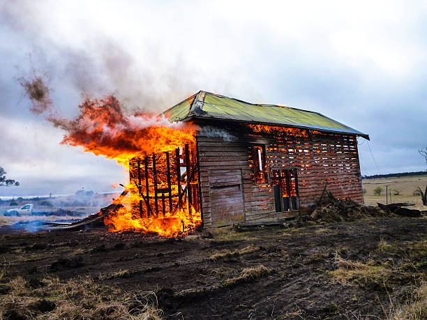 Flames engulfing house stock photo