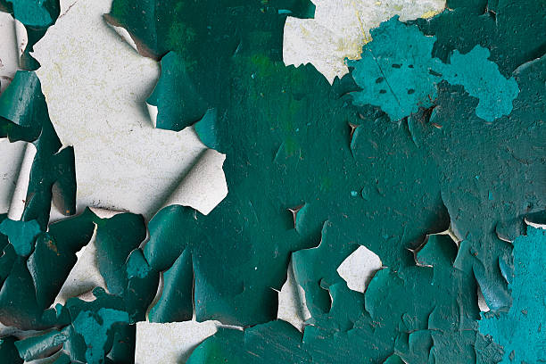 istock red rusted on the cyan green metal wall .Texture 472844918