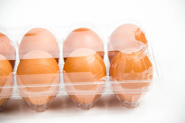 istock carton of fresh free range eggs on a white background. 472845728
