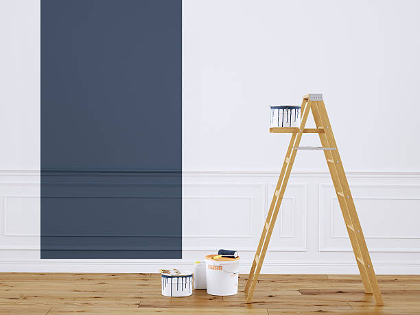 istock Painting walls in room with ladder during renovation. 3d rendering 472845800