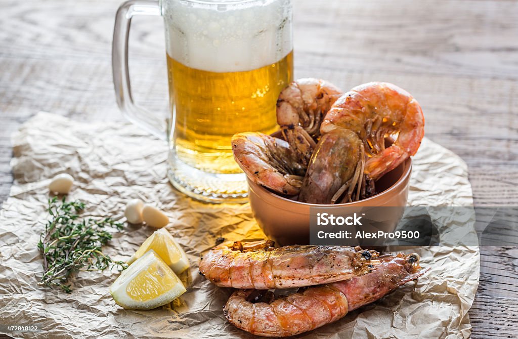 Fried shrimps with glass of beer 2015 Stock Photo