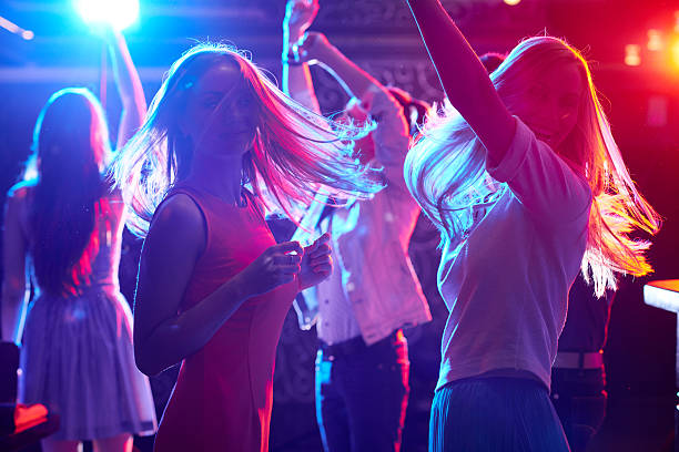 istock Women, dance, night club 472848134