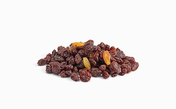 istock Dried raisins on a white background 472848744