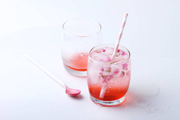 istock two glass of flower soda drinks 472850388