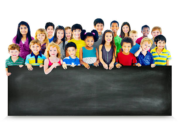 istock Multi-Ethnic Group of Children Holding Empty Blackboard 472857678