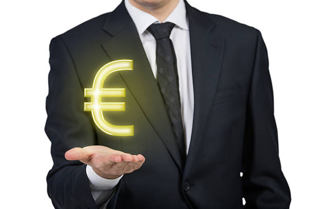 istock businessman holding euro 472861322