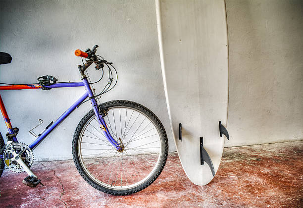 istock mountain bike and surfboard in hdr 472864592