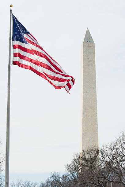 istock Washington Monument with American Flag 472869190