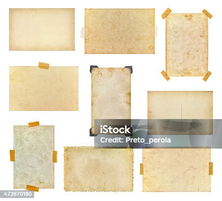 istock Set of vintage photos taped to a white background 472870180